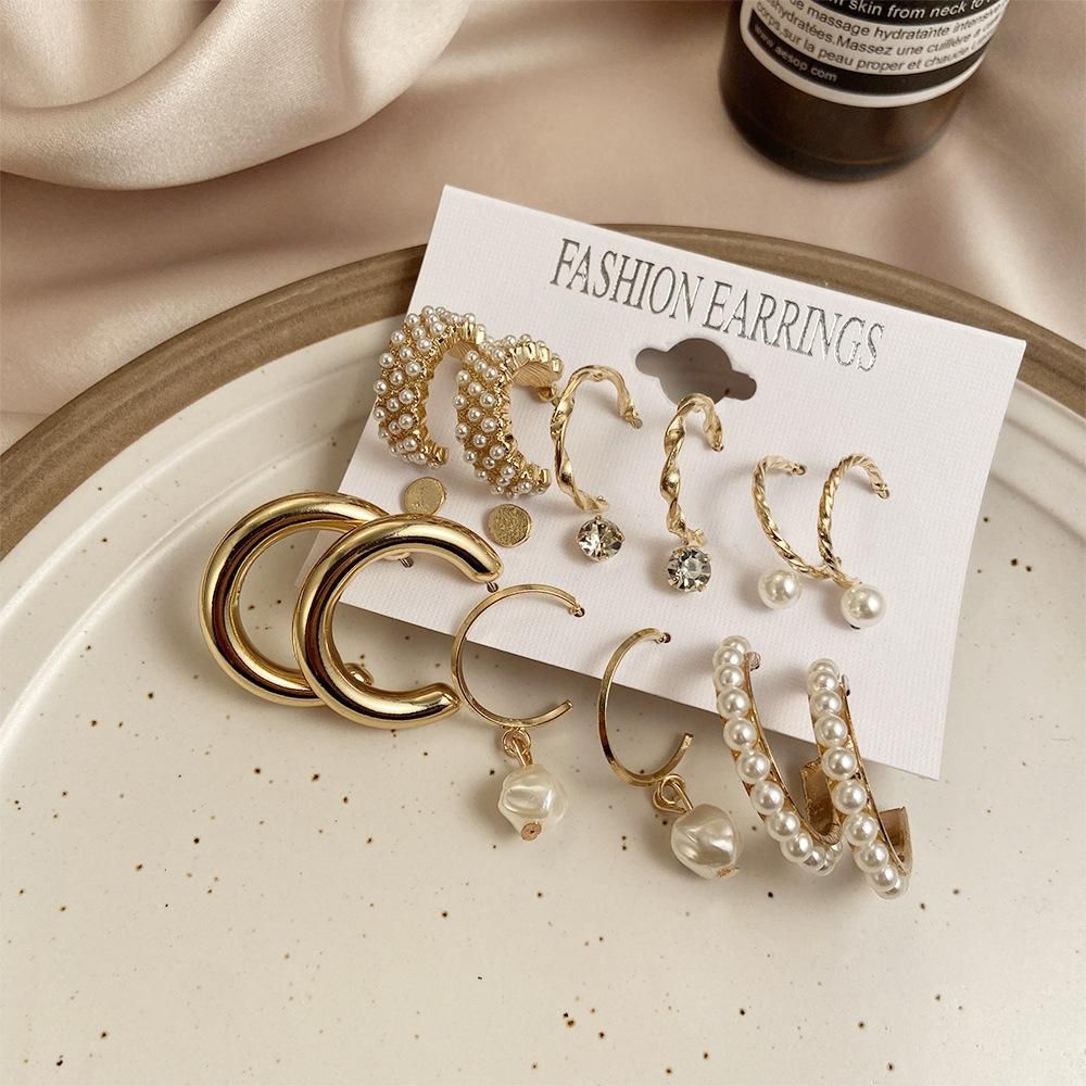 Cosmic Combo Of 9 Stunning Gold Plated Pearl Studs and Hoop Earrings | Cosmic Store